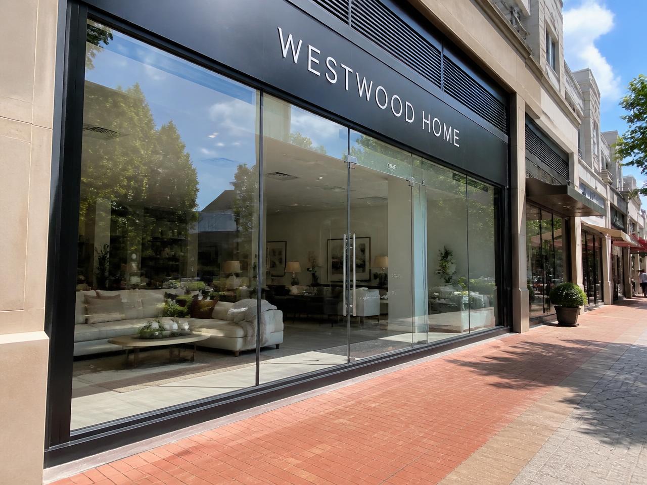 Clean storefront glass on a sunny street